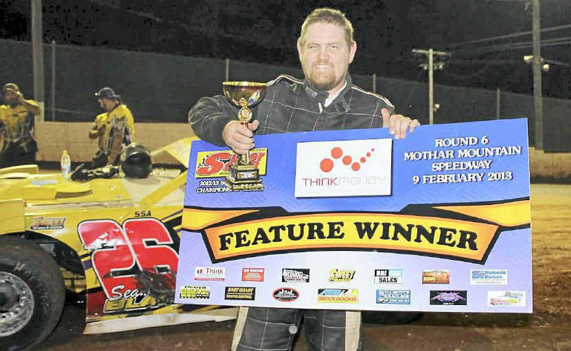 A delighted Craig Torr celebrates his epic victory in the V8 super sedans at Mothar Mountain at the weekend. A delighted Craig Torr celebrates his epic victory in the V8 super sedans at Mothar Mountain at the weekend.